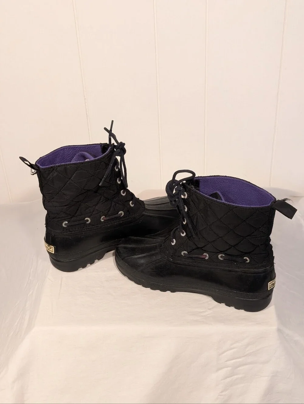 Sperry Black Quilted Duck Boots with Purple Lining